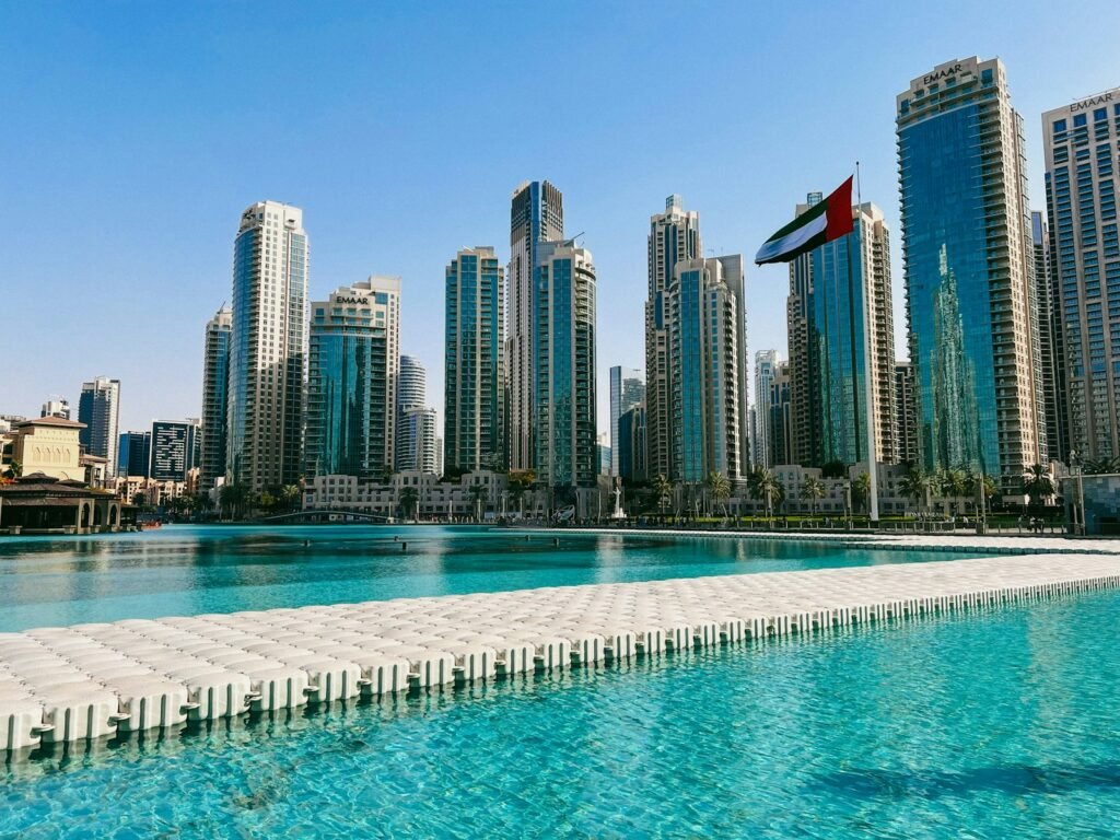 A large body of water with a city in the background