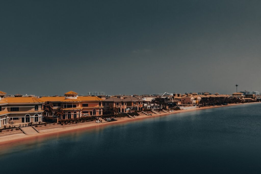 A large body of water next to a beach