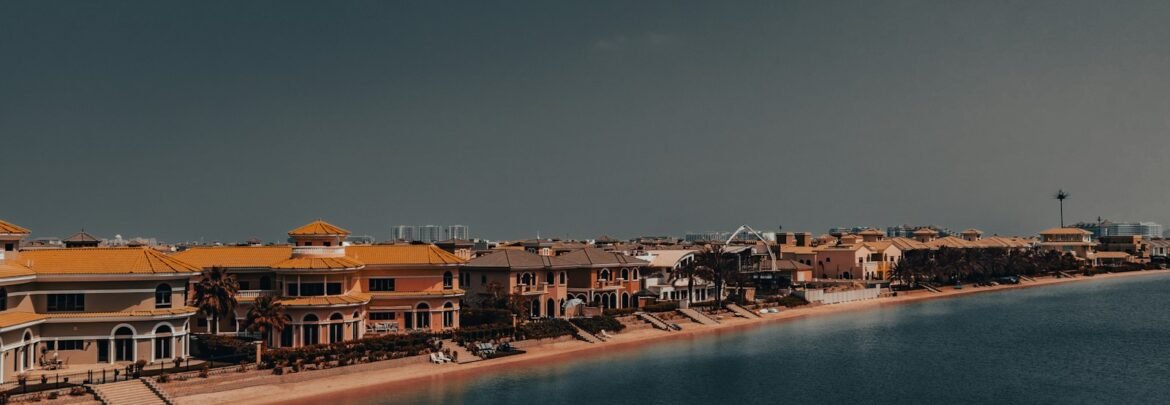 A large body of water next to a beach