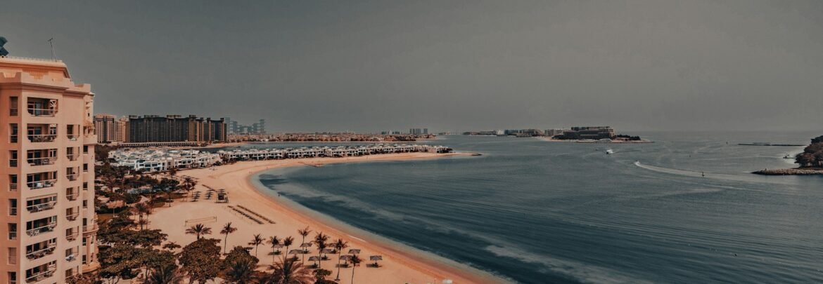 An aerial view of a beach and a city