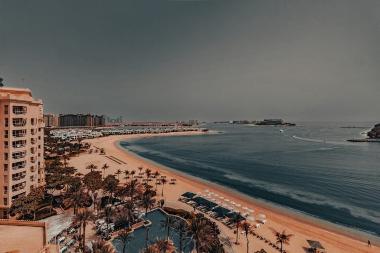 An aerial view of a beach and a city