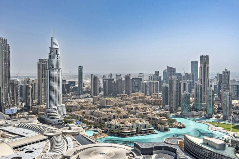 An aerial view of a city with a river running through it