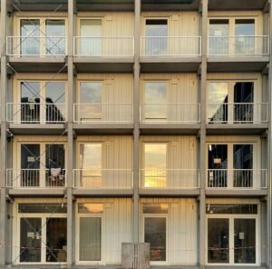 a tall building with multiple balconies and balconies