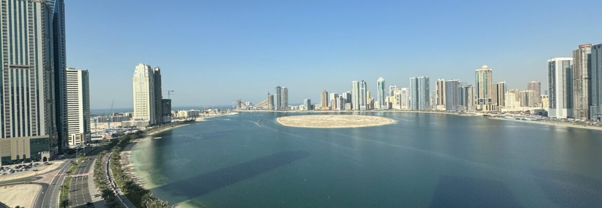 a large body of water surrounded by tall buildings
