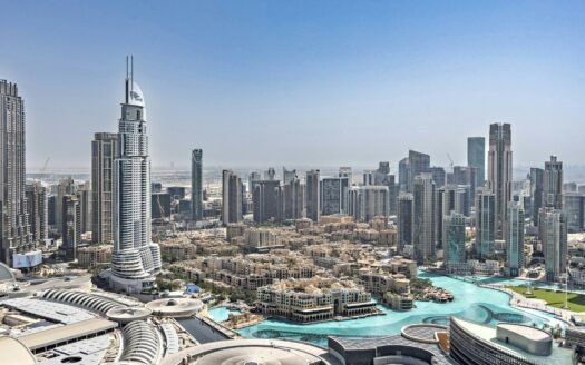 An aerial view of a city with a river running through it