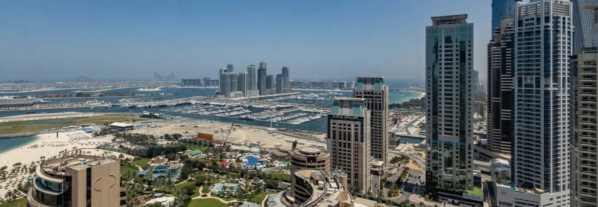 An aerial view of a city with tall buildings