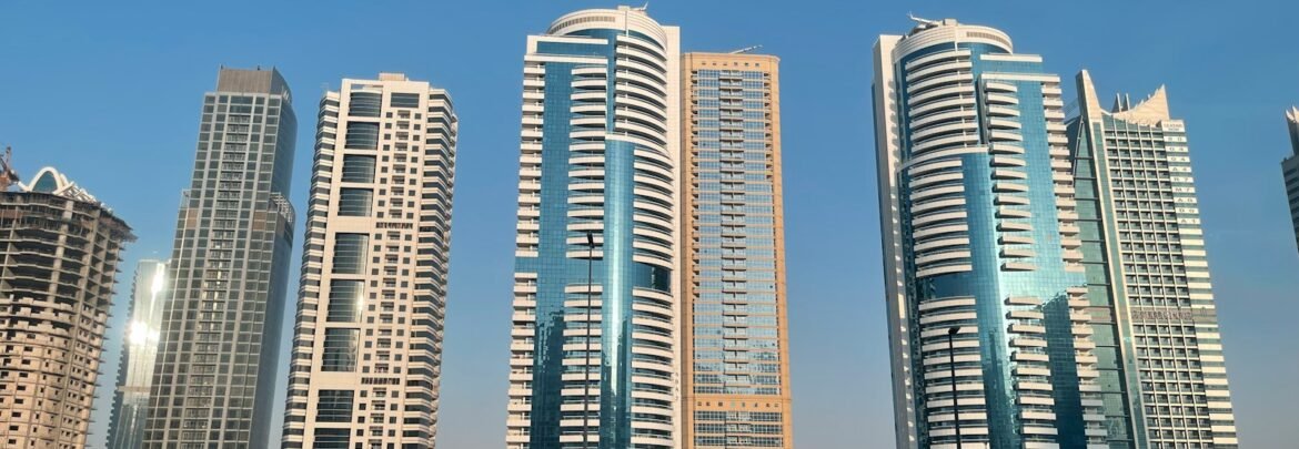 a group of tall buildings sitting next to each other