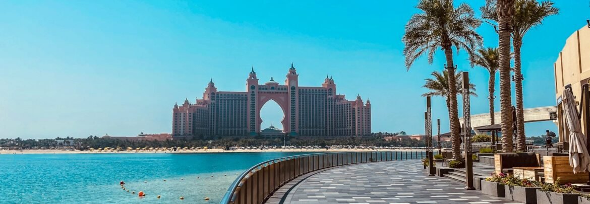 white concrete building near body of water during daytime