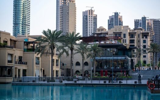 A large body of water surrounded by tall buildings