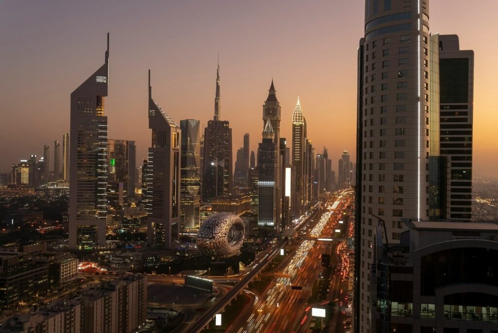 a view of a city at night from the top of a building