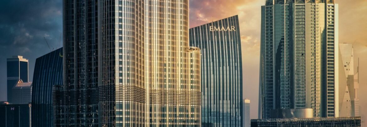 a large group of tall buildings in a city