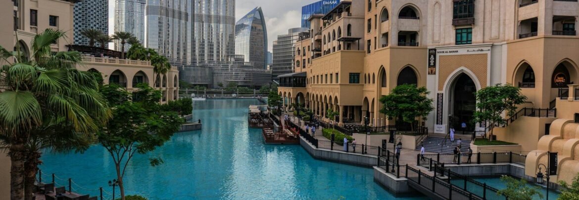 a large swimming pool surrounded by tall buildings