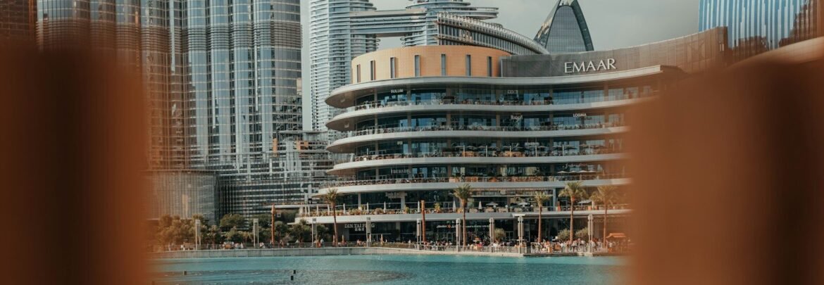 A blurry photo of a city with a pool