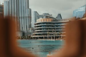 A blurry photo of a city with a pool