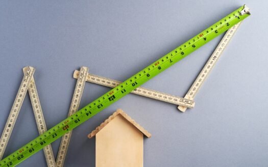 green ruler on white surface