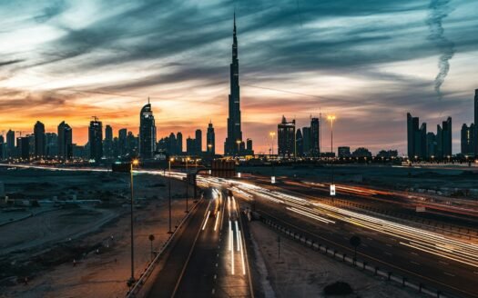 city skyline under cloudy sky during daytime