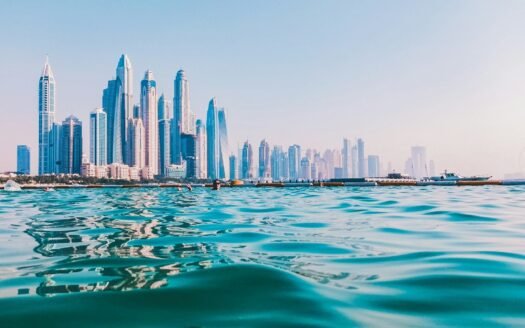 city skyline under blue sky during daytime